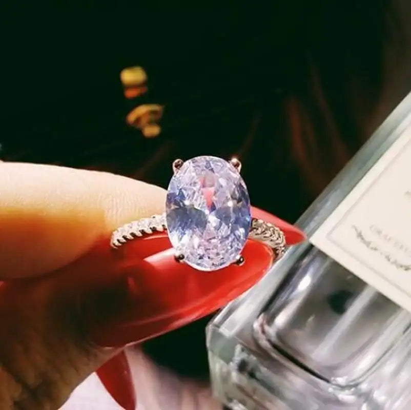 Radiance - Women's High Polished Stainless Steel Ring with AAA Grade Clear CZ Stones