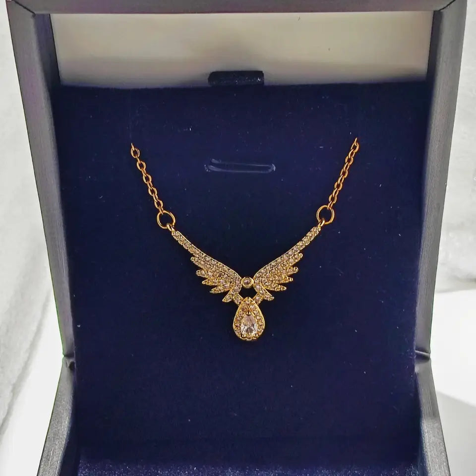 Soar - High Polished Stainless Steel Necklace with Wing Pendant