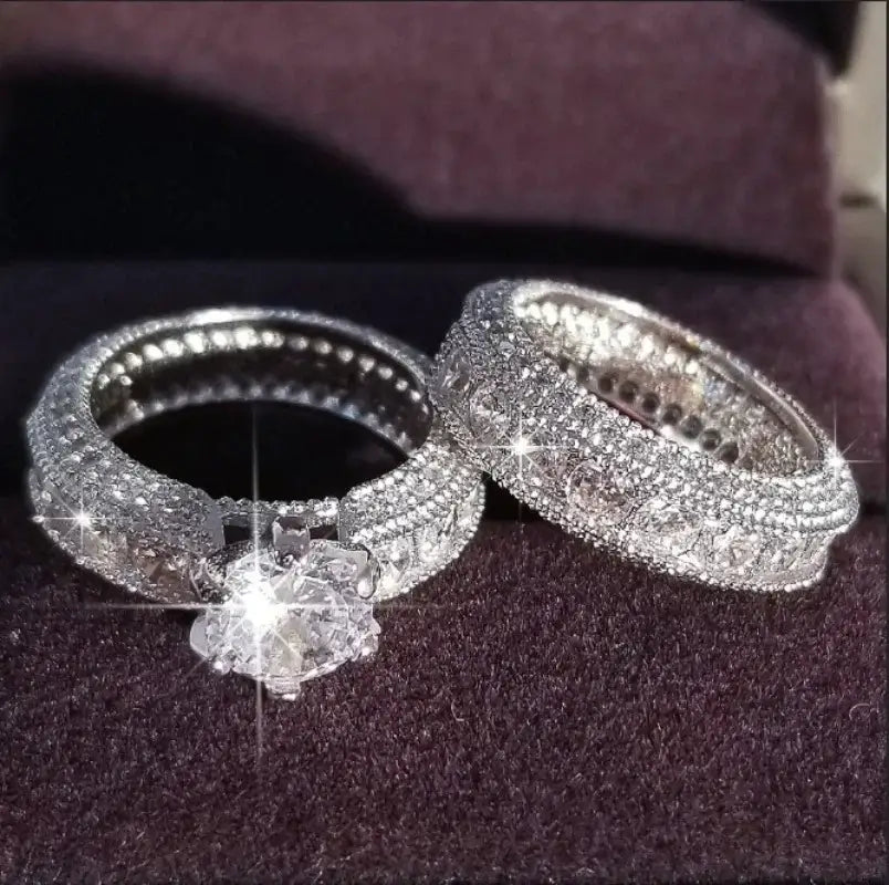 The Marchesa - White Marquise Cut Solitaire with Cubic Zirconia Studded Band Wedding Ring Set in Stainless Steel